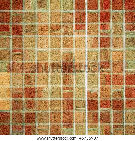A square brick tile background made from red, brown, and tan square bricks.