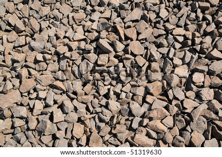 Brown clunky stones abstract background. These rocks are rough, not round