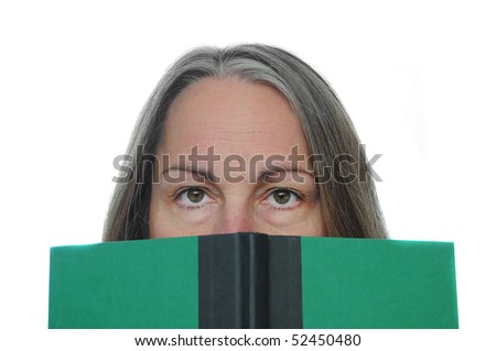 Woman reading a green hardcover book isolated on white background with room for your text