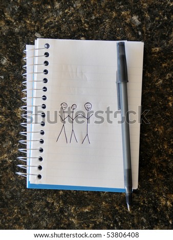 stock photo : Stick figure drawing of three people holding hands on a 