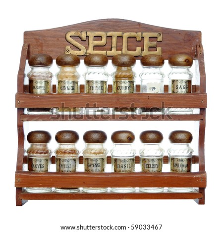 An old wooden spice rack isolated on white background. Most of the 