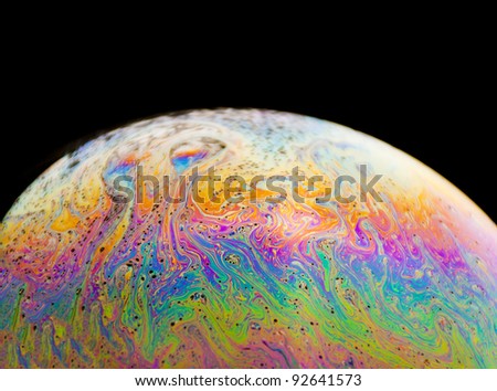 Macro closeup of a colorful soap bubble