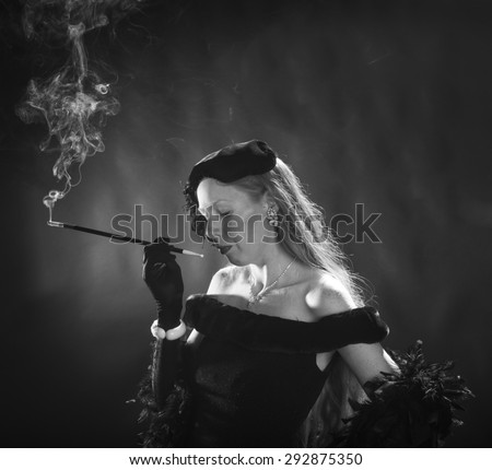 Elegant Black and White Portrait of Glamorous Woman Smoking Cigarette and Dressed in Vintage Clothing, Waist Up Portrait in 1940s Film Noir Style