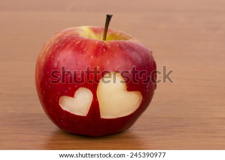 Two hearts on the fresh apple, a Valentines Day theme