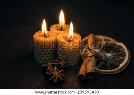 Composition with burning candles in dark