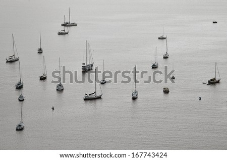 Group of different sailing ships on the open sea