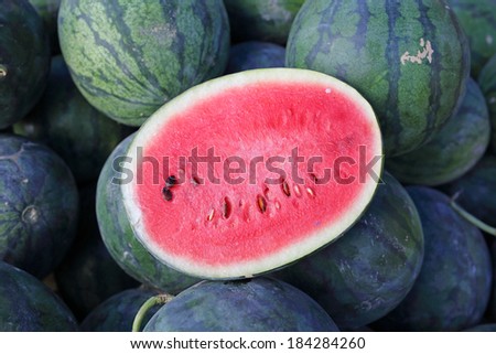 a slice water melon with large quality of the green watermelons in Thailand