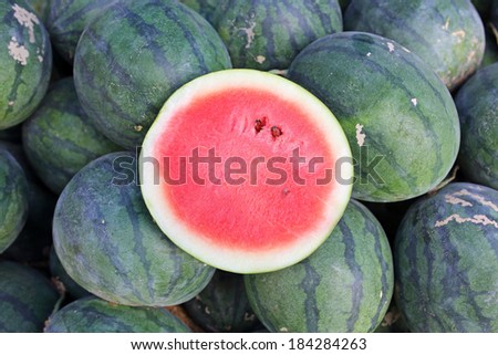 a slice water melon with large quality of the green watermelons in Thailand