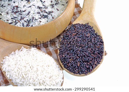 Organic Riceberry Rice (black jasmine rice) and white rice  on white background