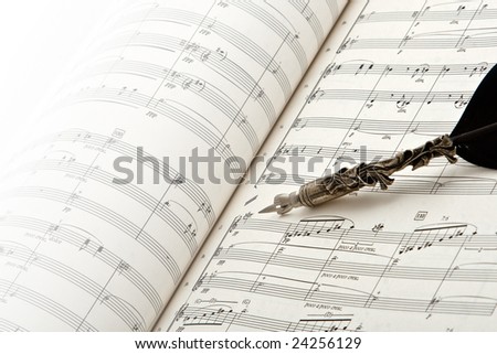 Antique pen and musical score
