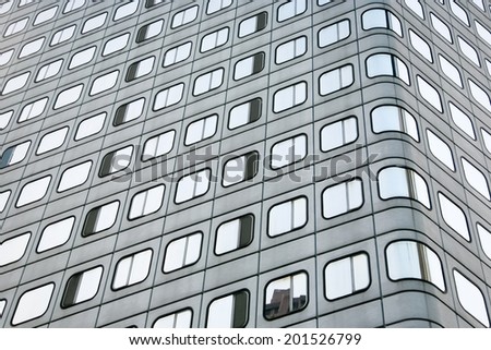 Skyscraper facade with rounded windows