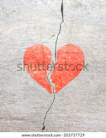 Crackled wall plaster texture with broken heart