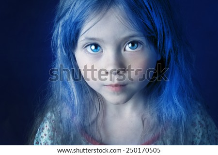 Mysterious mystic girl with blue hair