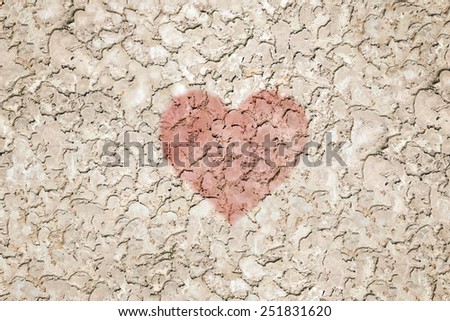 Rough wall plaster seamless texture with a heart