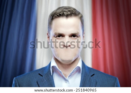 Symbol of censorship and freedom of speech: a young man without a mouth on a background of the national flag of France