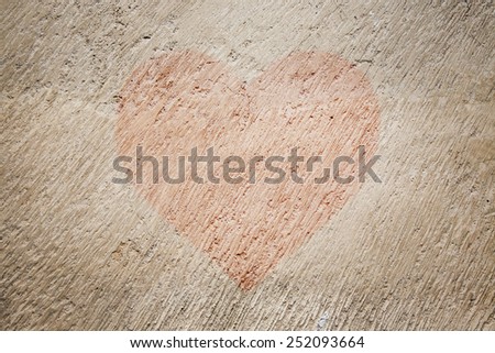 Old wall plaster texture, picture of red heart fof Valentine`s D