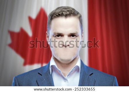 Symbol of censorship and freedom of speech: a young man without a mouth on a background of the national flag of Canada