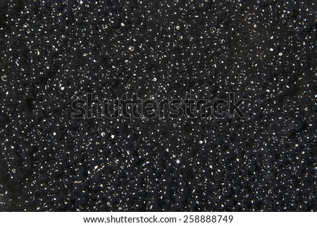 Texture of black caviar