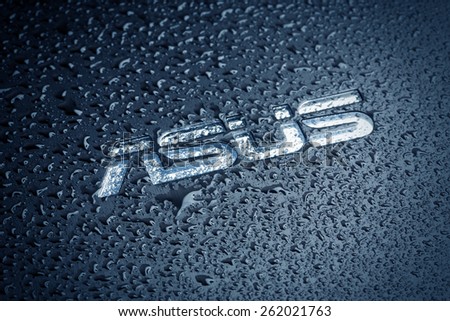 KAZAN, RUSSIA, 15 March 2015: water drops on the Asus logo
