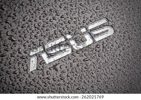 KAZAN, RUSSIA, 15 March 2015: water drops on the Asus logo