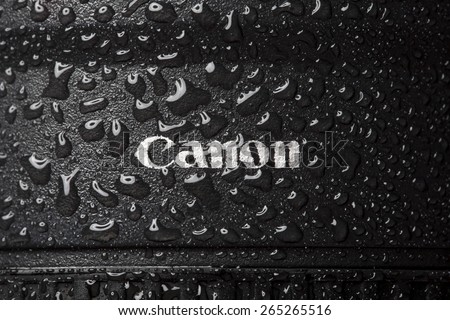 KAZAN, RUSSIA, 15 March 2015: water drops on the Canonr logo