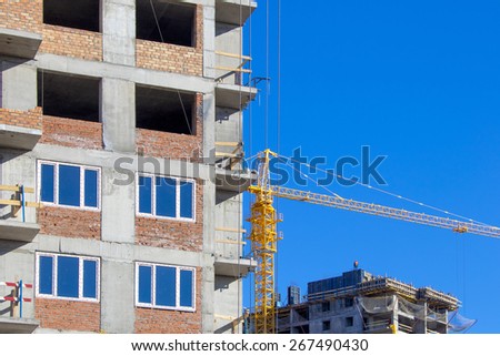 Construction crane and a building house