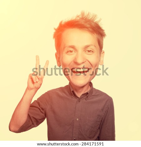 Young man with the fingers in a \