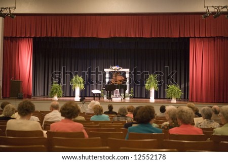 A small crowd waits for the start of a piano recital in Marion, South Carolina.