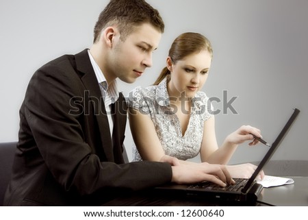 Young man and woman working together