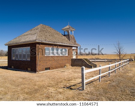 An old one room school house on the vast Nebraska prairie