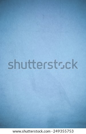Textured recycling paper blue background. blur