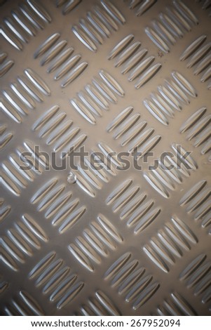 Stainless steel with non slip pattern.