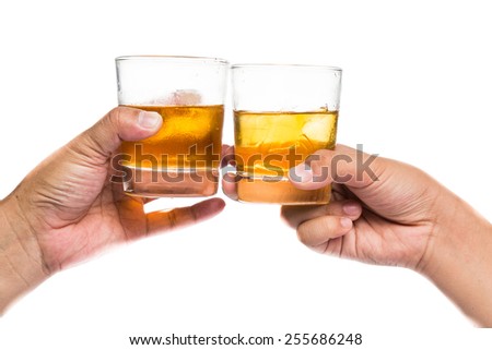 Two hands toasting whiskey on the rock, with isolated background