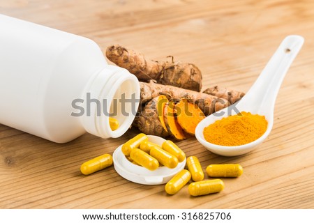 Homemade turmeric capsule from freshly grounded turmeric roots
