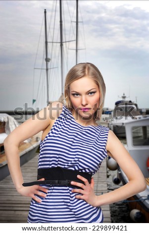 beautiful young blond woman dressed as a sailor