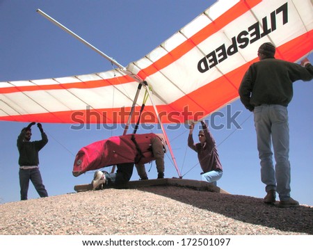 Mingus Mountain, AZ -Â?Â? May 1, 2004:  Hang glider launches from Mingus Mountain near Jerome, AZ.