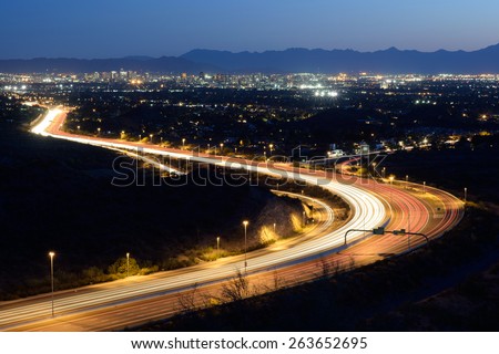 Phoenix city skyline and highway (twilight version)