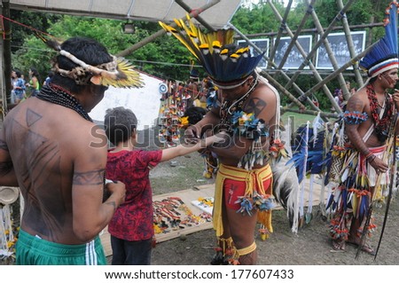 RIO DE JANEIRO, BRAZIL - JUNE 20, 2012: Indigenous tribe from Amazon perform at The United Nations Conference on Sustainable Development, also know as Rio+20.