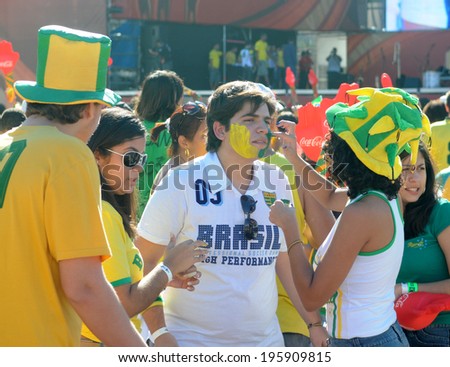 RIO DE JANIERO, BRZAIL - JUNE 21, 2010 fans celebrate the victory of Brazil in the arena FIFA fan fest on Copacabana beach