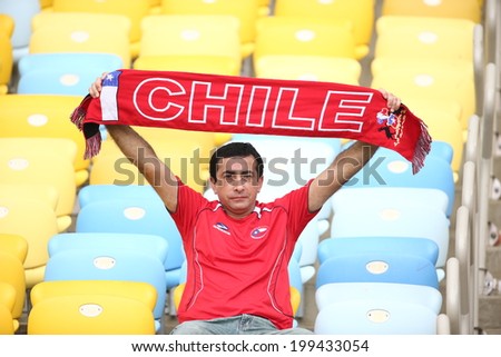 RIO DE JANEIRO, BRAZIL - June 18, 2014: Chilean soccer fan celebrates at the 2014 World Cup Group B game between Spain and Chile at Maracana Stadium. No Use in Brazil