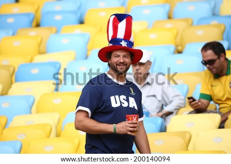 RIO DE JANEIRO, BRAZIL - June 22, 2014: Soccer fans celebrating at the 2014 World Cup Group H game between Belgium and Russia at Maracana Stadium. No Use in Brazil.
