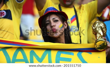 RIO DE JANEIRO, BRAZIL - June 28 2014: Soccer fans celebrating at the 2014 World Cup game between Colombia  and Uruguay at Maracana Stadium. No Use in Brazil