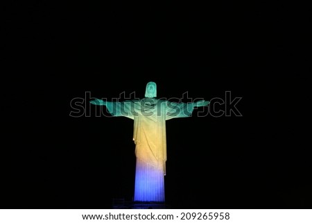 Rio de Janeiro, Brazil, August 5, 2014 Christ the Redeemer (Corcovado), lit with the Olympic colors, to remember missing two years for the Olympic Games in Rio de Janeiro, not use in brazil