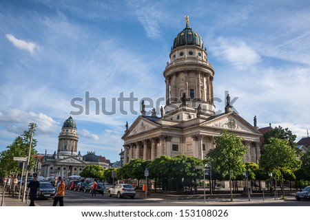 BERLIN, GERMANY - June 16, 2013: French Cathedral and German Cathedral in Gendarmenmarkt Square on June 16, 2013 in Berlin, Germany.