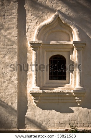 window in the white ancient russian church
