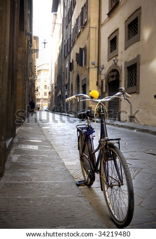 Old bicycle on the Florence street. Italy.