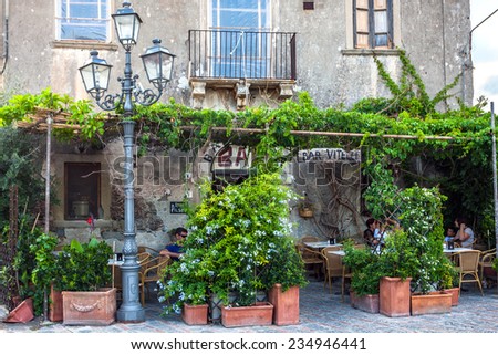 Forza d\'Agro, Italy - July 10, 2014: Bar Vitelli in Savoca was the location for the scenes set in Corleone of Francis Ford Coppola\'s The Godfather. The Bar is still a functioning establishment