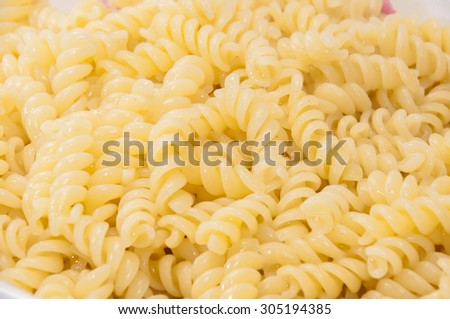 Cooked macaroni in close view.