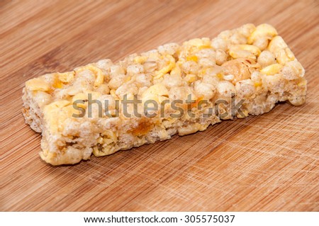 Candy bar cereal on the wooden board.