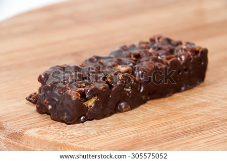 Candy bar cereal on the wooden board.